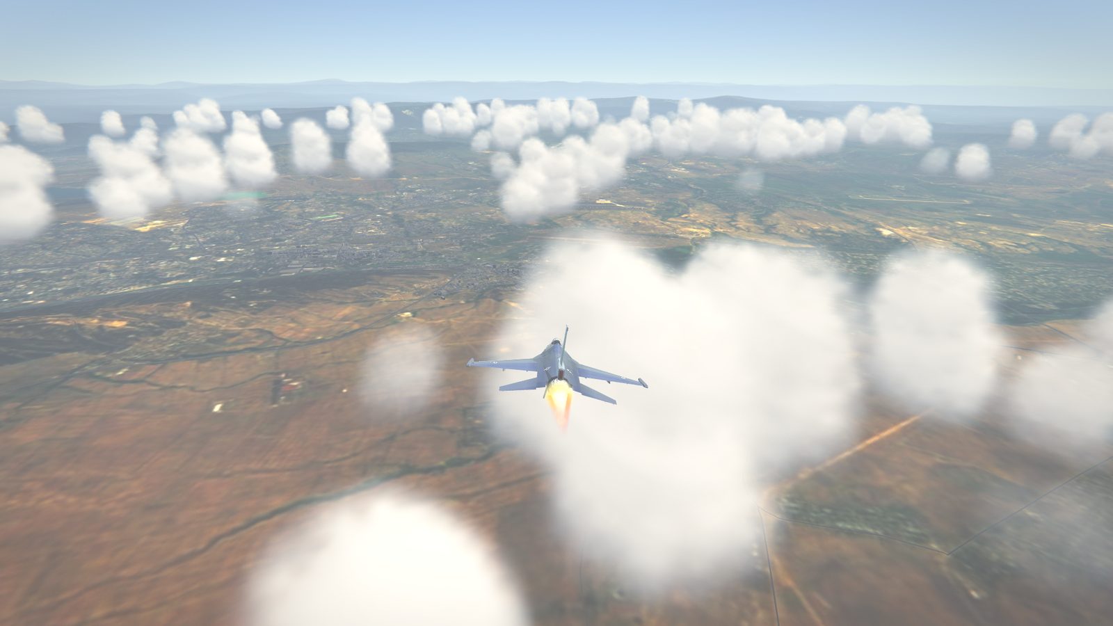 Cloud banks over rolling hills